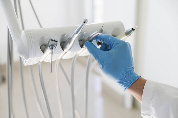 Professional Tooth Extraction technician working in Claude, TX